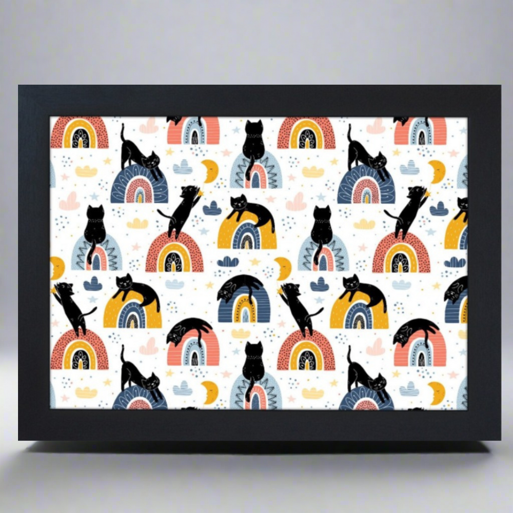 Framed artwork with black cats on rainbow patterns