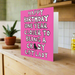 Pink birthday card with text and a cat illustration on a white background