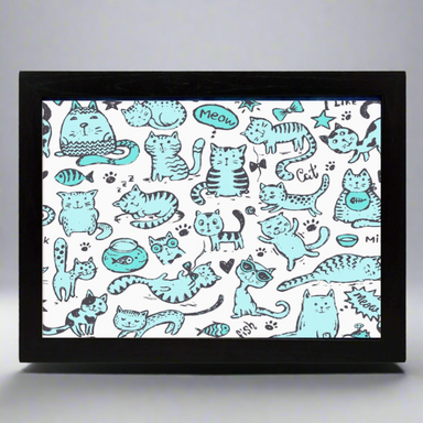 Framed artwork with a pattern of blue cats on a white background