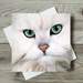 Card with a white cat's face on a wooden surface