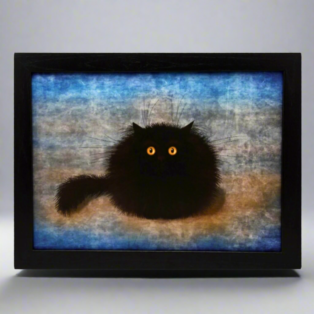 A lap tray with a printed image of a black cat with orange eyes on a blue background.