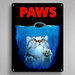 Metal sign with a cat and mouse underwater scene and 'PAWS' text.