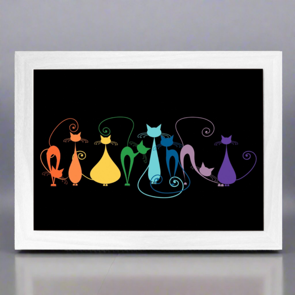 A lap tray with a black background featuring a colorful silhouette of a group of cats in various hues.