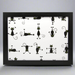 Framed artwork with black cat illustrations on a white background